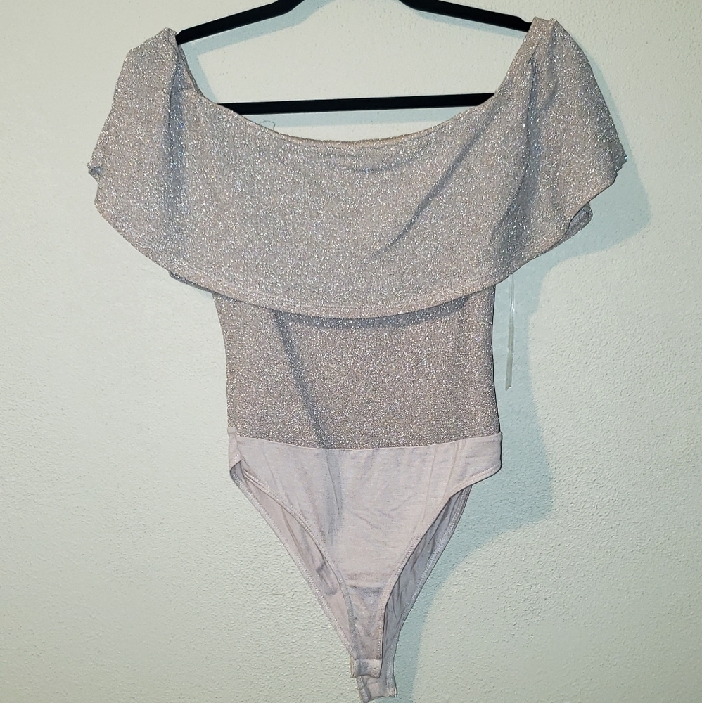 Pink sparkle body suit